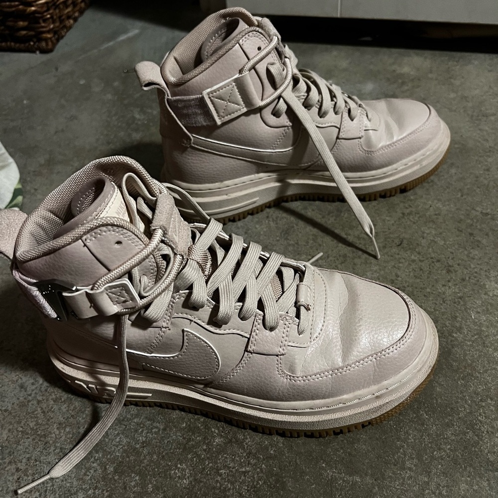 Women’s beige Nike Air Force One High Tops